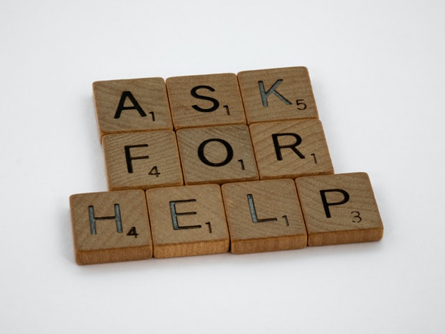 Ask for help displayed on scrabble pieces