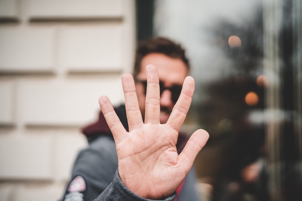 Man showing 5 ways to thrive